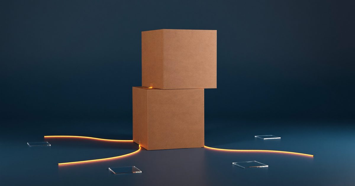 Two plain cardboard parcels stacked on a dark floor, with glowing orange lines running from them across the floor towards small glass tiles, illustrating one pool of stock feeding several sales channels.
